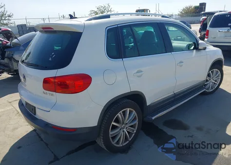 2014 Volkswagen Tiguan Sel из США, поврежденный, VIN WVGAV3AX5EW510993